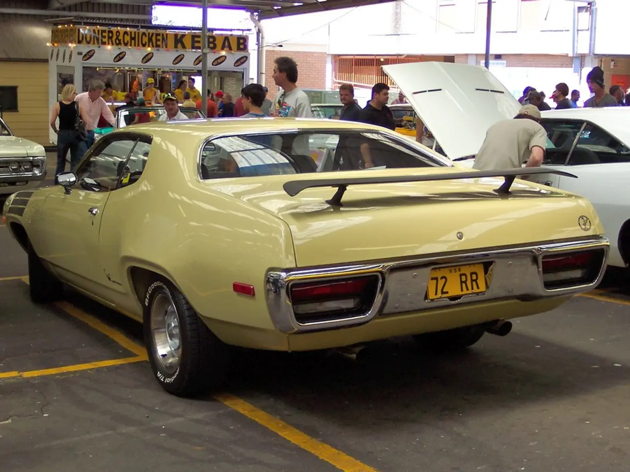 Vintage automobiles journeyed through Eurasia by a Czech team, bound for the Osaka Exposition.